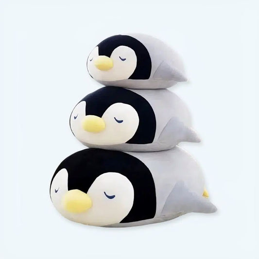 Peluche pingouin dodo câlin pour une douce nuit d'hiver