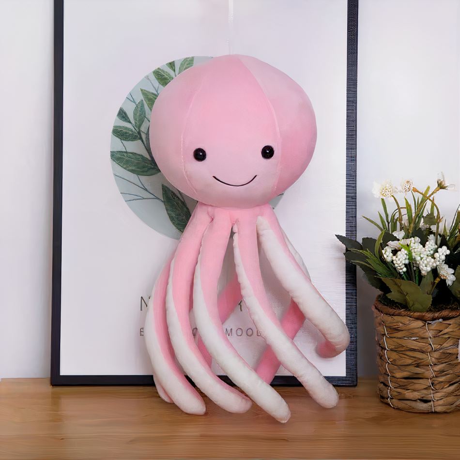 Peluche poulpe rose mignon et doux de l'univers marin cosy