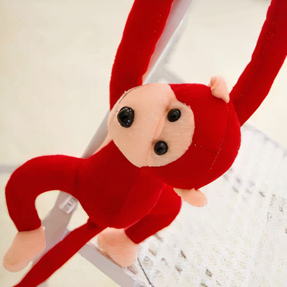 Peluche singe Kawaii avec longue queue rouge -