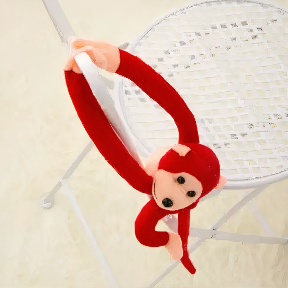 Peluche singe Kawaii avec longue queue rouge -