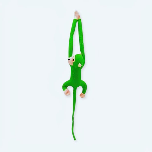 Peluche singe kawaii avec une longue queue verte de jungle.