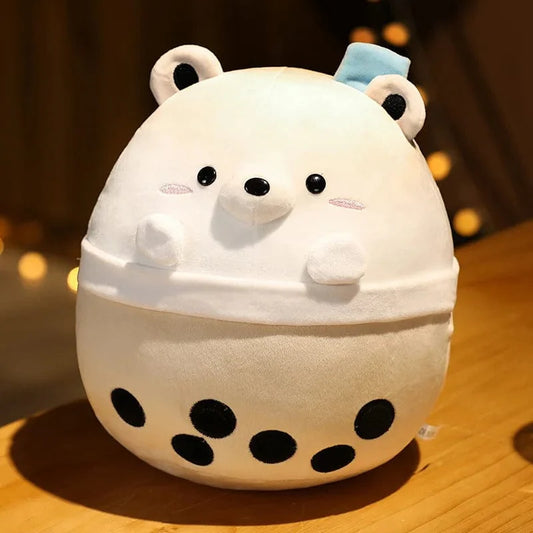 Peluche squishmallow ours blanc dans son bol confort.