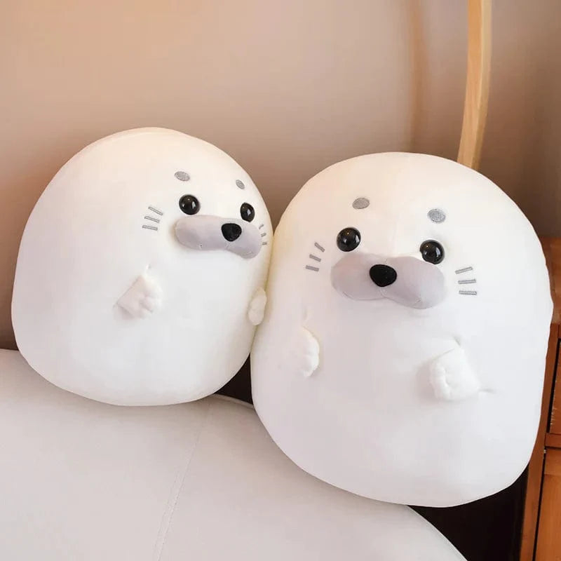 Peluche squishmallow phoque arc-en-ciel