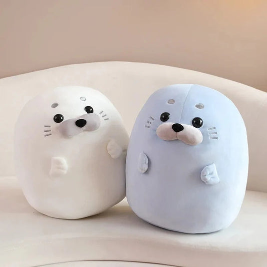 Peluche squishmallow phoque arc-en-ciel
