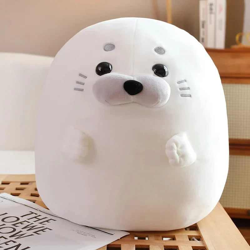 Peluche squishmallow phoque arc-en-ciel