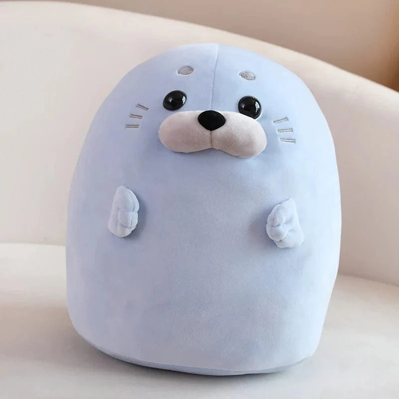 Peluche squishmallow phoque arc-en-ciel
