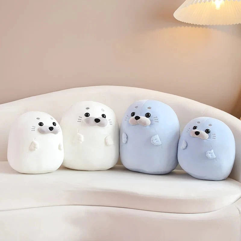 Peluche squishmallow phoque arc-en-ciel