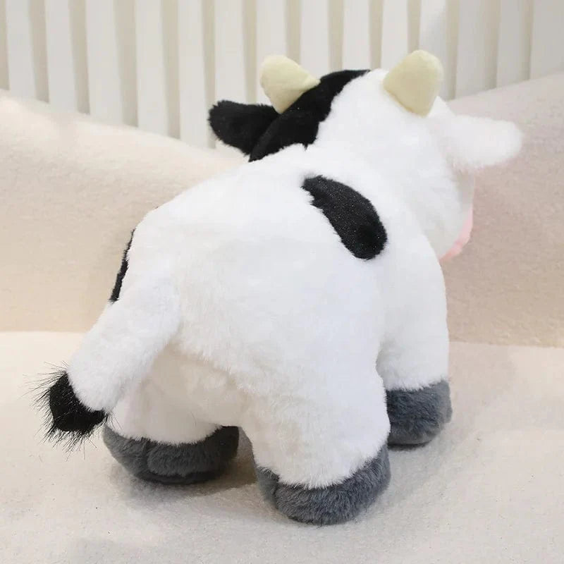 Petite et mignonne peluche vache.