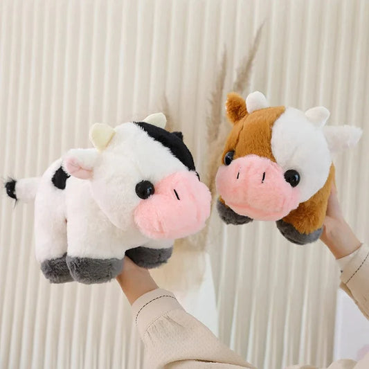 Petite et mignonne peluche vache.