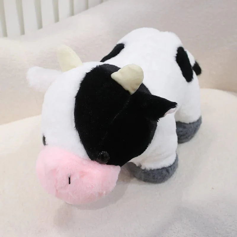 Petite et mignonne peluche vache.