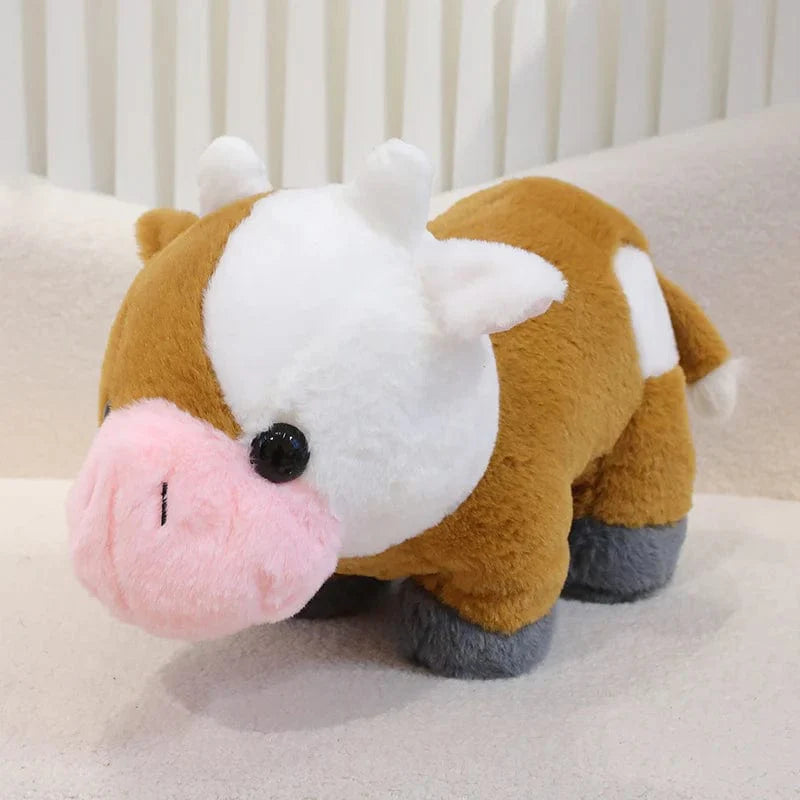 Petite et mignonne peluche vache.