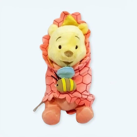 Peluche Winnie l'Ourson : la couverture douce réconfortante pour enfant